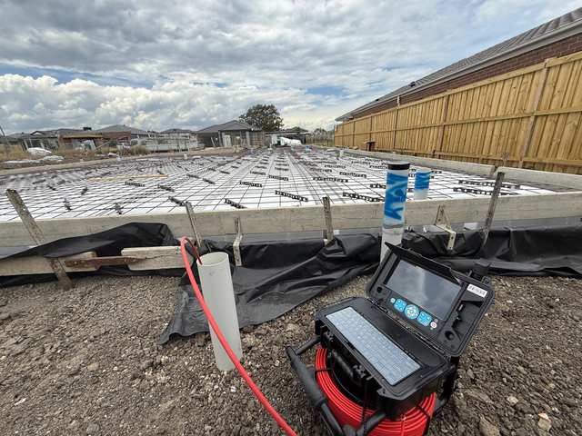Drainage set out and inspected with a CCTV camera unit across a reinforced slab on a new Melbourne estate before the pour